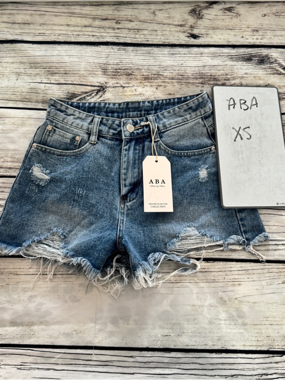 Women's Distressed Denim Shorts in Blue